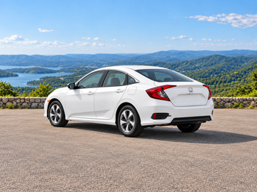 Иллюстративное изображение, созданное ИИ: Honda Civic Sedan 2019, вид сзади в три четверти на сухом дорожном покрытии среди живописного пейзажа. Цвет и комплектация реального автомобиля могут отличаться.